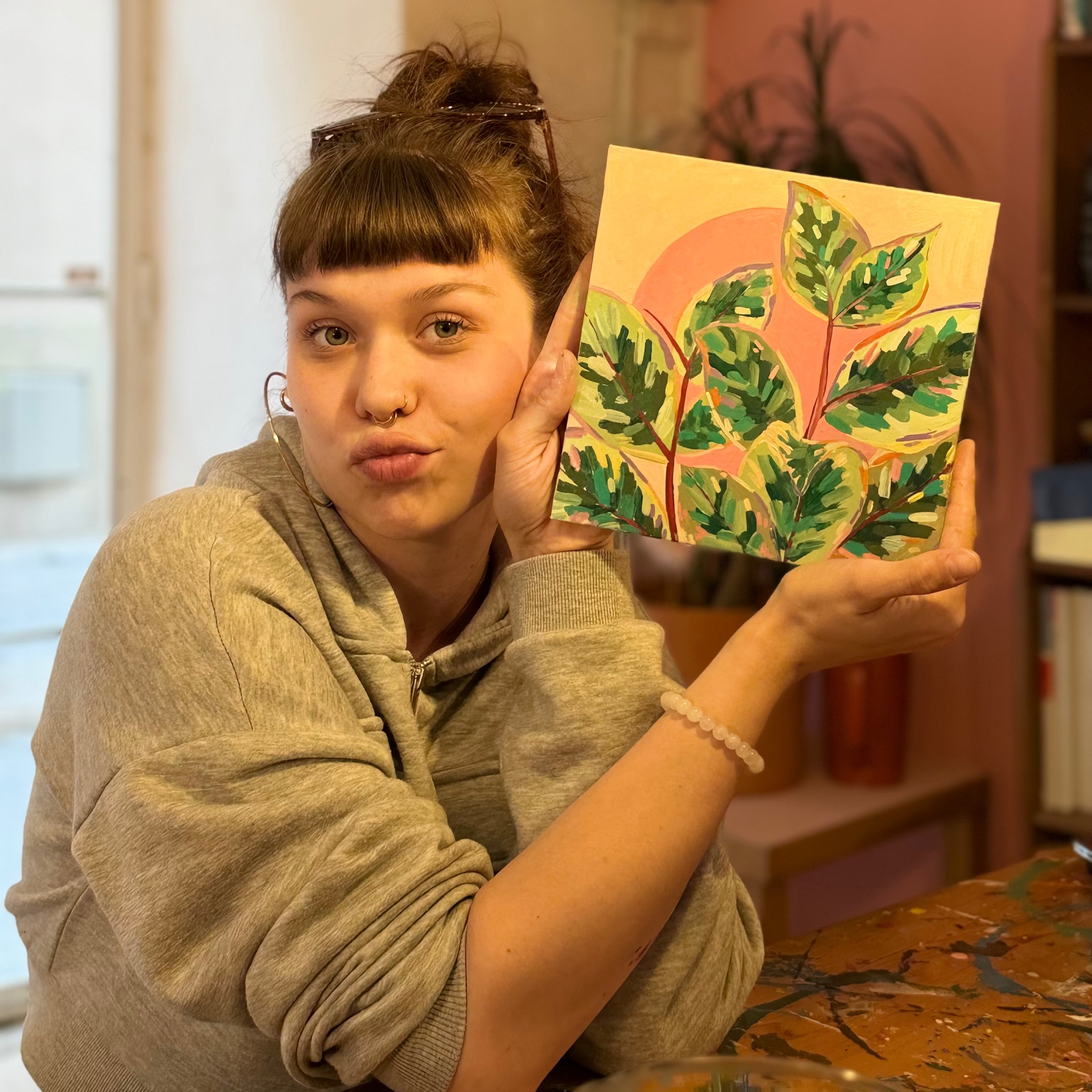 Creative team member at Fun Art Club Palma with handmade artwork